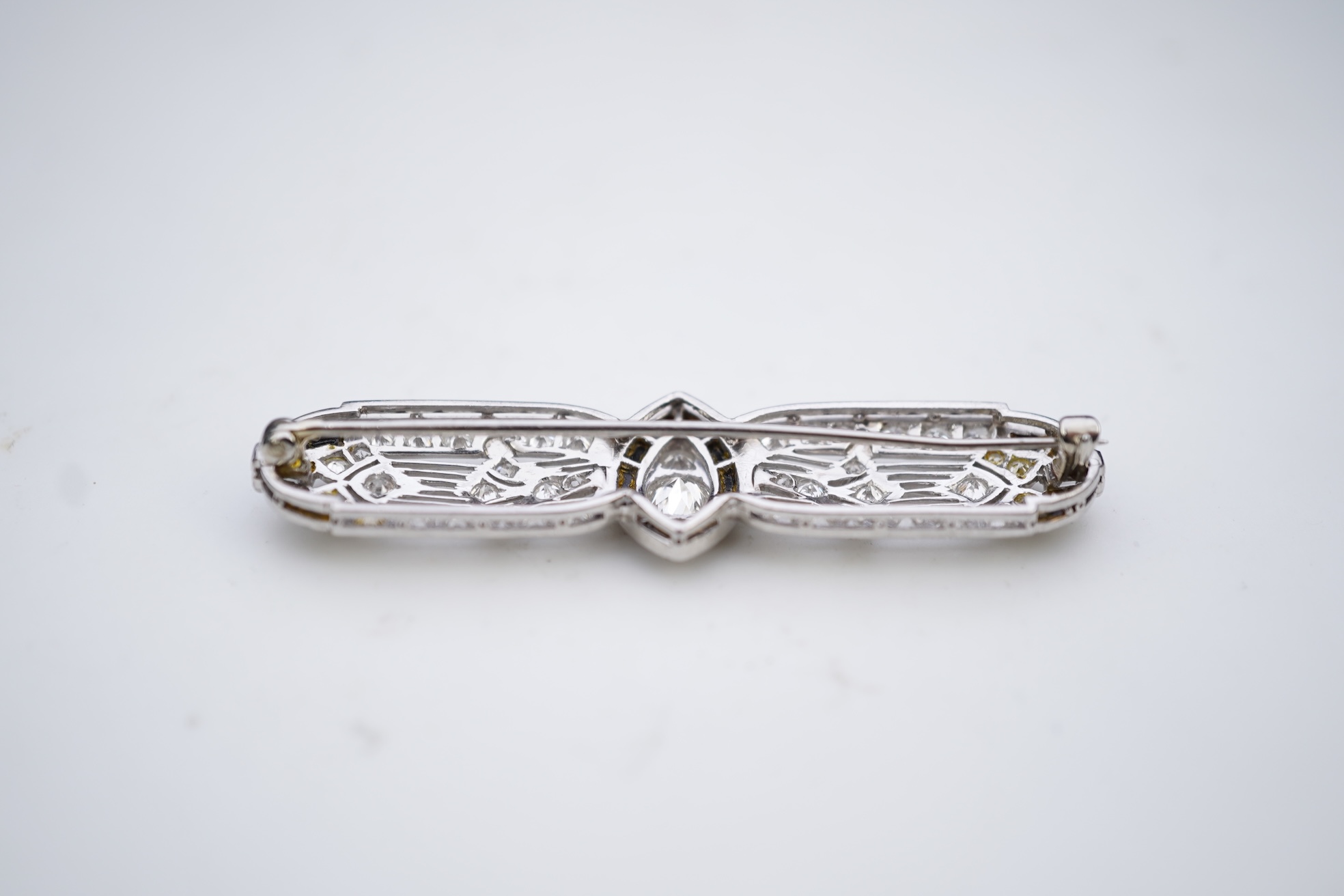 An Art Deco onyx and diamond brooch, 1920s